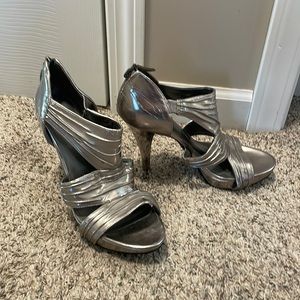 Guess High Heels. Chrome colored. Size 8M